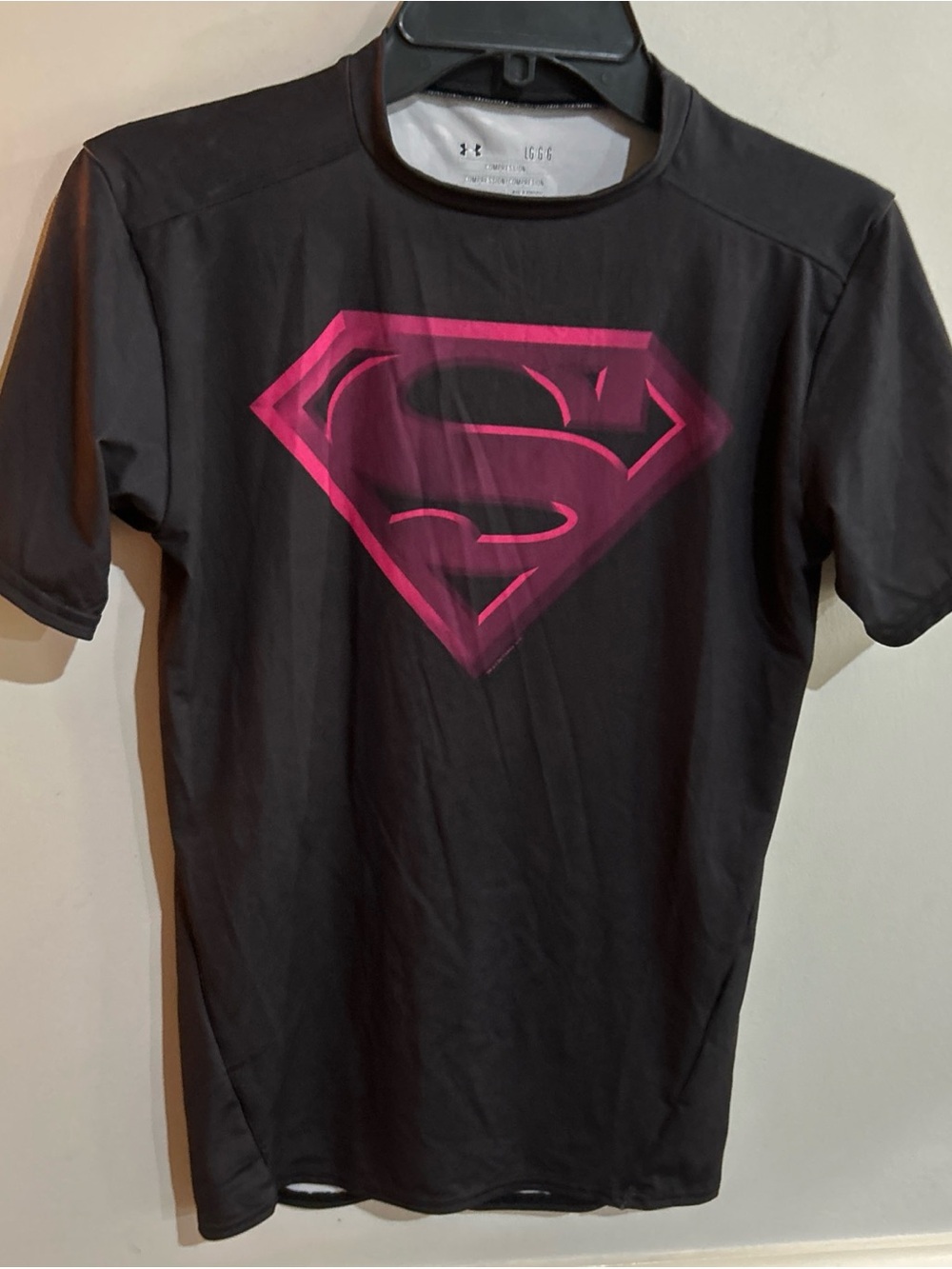 Under Armour Men’s Black Tee with Pink Superman Emblem